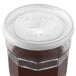 A plastic container lid with a straw slot for Cambro tumblers.