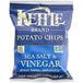 A case of 24 blue bags of Kettle Brand Sea Salt & Vinegar Potato Chips.