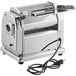 An Imperia stainless steel pasta machine with a black cord.