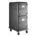 A black metal Cambro Pro Cart Ultra with wheels.