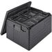 A black plastic Cambro Cam GoBox with many empty compartments inside.