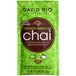 A green package of David Rio Green Tea Chai Latte Single Serve Packets with brown and white text.
