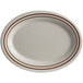 A beige oval melamine platter with a brown speckled border.