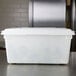 A white Rubbermaid polyethylene food storage box on a counter.