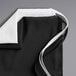 A black polyester bib apron.