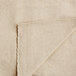 A beige canvas drop cloth with a close up of the fabric.