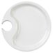 A white melamine plate with a circular hole in the middle.