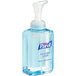 A plastic bottle of Purell Healthy Soap foaming hand soap with a pump top.