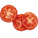 A close-up of two slices of tomatoes on a white background.