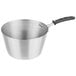 A Vollrath stainless steel sauce pan with a black silicone handle.