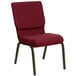 A burgundy Flash Furniture church chair with metal legs.
