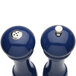 Two cobalt blue Chef Specialties salt and pepper mills with a silver lid.