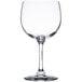 A close-up of a Libbey customizable round wine glass with a stem.