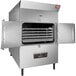 A Southern Pride gas rotisserie smoker with open doors.