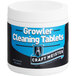 A white container of National Chemicals Inc. Craft Meister Growler Cleaning Tablets with a blue label on a counter.