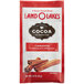 A red and white Land O Lakes Cocoa Classics package with a label that reads "Cinnamon and Chocolate" containing cinnamon sticks.