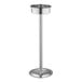 A silver stainless steel stand with a round base and a metal pole with a round bowl on top.