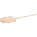 A wooden paddle with a long handle.
