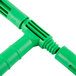 A green plastic T-bar with two handles on a white background.