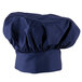 A navy blue chef hat with a blue cloth on top.