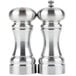 A Chef Specialties Westin salt and pepper shaker set with silver tops.