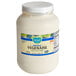 A white plastic container of Follow Your Heart Original Vegenaise with a label.