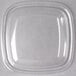 A clear Sabert square plastic dome lid on a clear square plastic bowl.