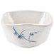 A white square bowl with blue bamboo design.