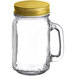 A clear glass Acopa Mason candle jar with a handle and yellow lid.