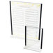 A Cal-Mil Classic Black Trim Displayette holding a menu on a clear acrylic stand.