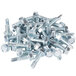 A pile of Manitowoc caster screws on a white background.