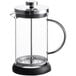 An Acopa glass coffee press with a metal lid and black and silver accents.