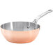 A de Buyer Prima Matera copper stir fry pan with a stainless steel handle.
