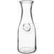 An Acopa clear glass vase with a round neck.