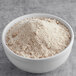A bowl of Gold Medal Spice Cake mix powder.