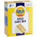 A box of Gold Medal Spice Cake Mix with a slice of spice cake with white frosting.