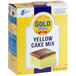 A yellow box of Gold Medal yellow cake mix with a picture of cake on it.