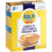 A case of 6 boxes of Gold Medal Complete Buttermilk Pancake Mix on a white background.