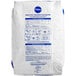 A white bag of Pillsbury Bakers' Plus Dark Devil's Food Cake Mix with blue text and instructions.