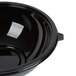 A black Fineline PET plastic bowl with a lid.