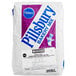 A white bag of Pillsbury Bakers' Plus Double Dark Chocolate Cake Mix with blue and white text.