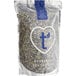 A bag of Wild Hibiscus Whole Dried Butterfly Pea Flowers with a white label.