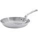 A de Buyer Mineral B Pro carbon steel frying pan with a silver handle.