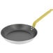 A de Buyer aluminum non-stick frying pan with a yellow handle.