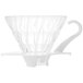 A white glass coffee dripper with a white handle.
