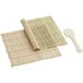 A close-up of an Emperor's Select bamboo sushi mat with a bamboo rice paddle.