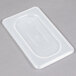 A Cambro translucent plastic lid on a white surface.