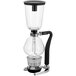 A Hario glass coffee maker with a metal stand and black handle.