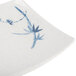A white rectangular melamine plate with a blue bamboo design.
