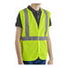 A young man wearing a lime high visibility surveyor's safety vest.